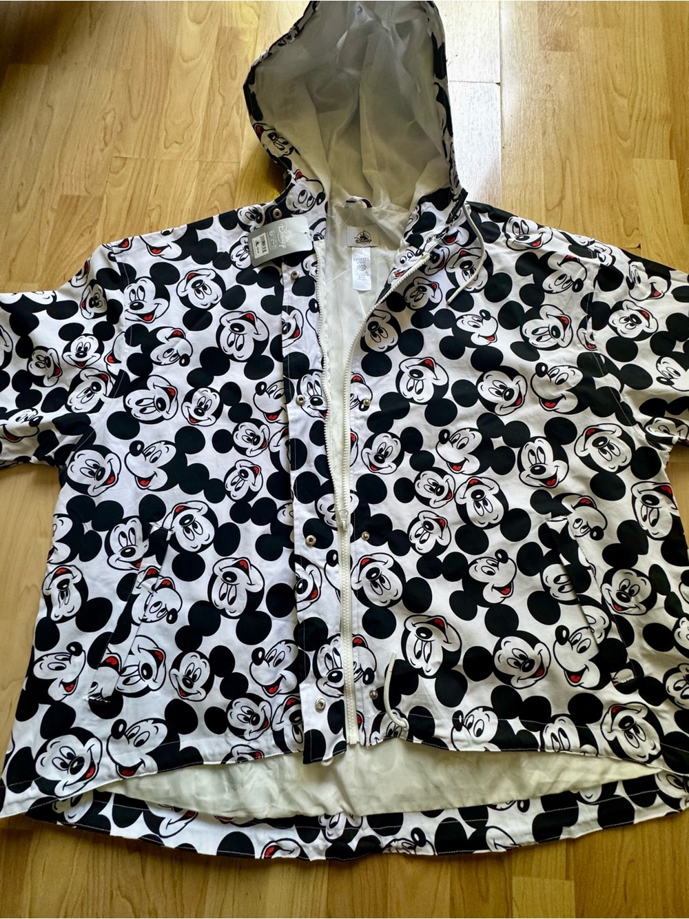 New w Tags. Women’s Black & White Mickey Mouse Hooded Jacket/raincoat. VERY CUTE